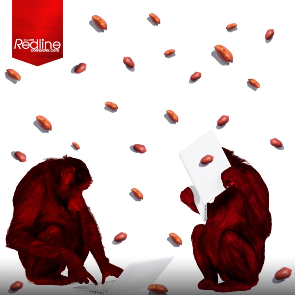 Monos rojos usando portátiles con cacahuetes voladores  por detrás, creados por Redline Company